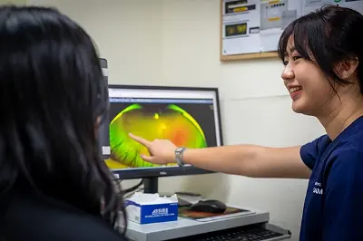 Optometry student performing Ultrawide Field Imaging